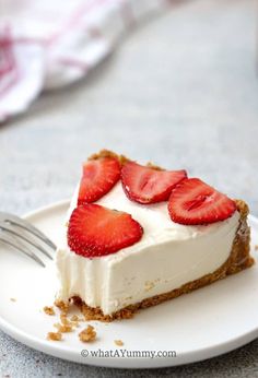 a slice of no bake cheesecake with strawberries on top and the words, 4 - ingredient no bake cheesecake