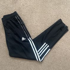 Never Worn Adidas Youth Joggers. Size 11/12. No Flaws. Perfect Condition Just Store Took Tags Off. Black With White Stripes. Functional Drawstring At Waist And Zippers On Bottom For Easy On Off With Cleats Adidas Bottoms, Adidas Joggers, Girly Accessories, Off Black, Black Adidas, Kids Bottoms, On Off, White Stripe, Sweatpants