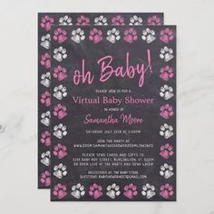 a chalkboard baby shower with pink and silver paw prints