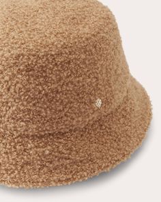 Helen Kaminski Mackenzie Bouclé Bucket Hat | OLIVELA Luxury Mini Hats With Short Brim For Spring, Luxury Short Brim Hat, Luxury Chic Brimmed Mini Hats, Chic Luxury Brimmed Mini Hats, Luxury Women's Curved Brim Bucket Hat, Luxury Beige Brimmed Bucket Hat, Luxury Short Brim Mini Hats For Spring, Luxury Mini Hats With Curved Brim For Summer, Luxury Summer Mini Hats With Curved Brim