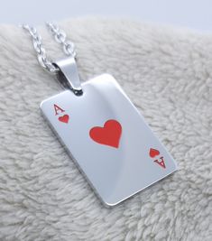 Ace of hearts pendant necklace. Good luck pendant or symbol of love. Mirror polished finish with red enamel hearts. Best quality  stainless steel.  Casual wear. Great accessory for men or women. Gift for valentines birthdays women. Pendant 30mm x 20mm. With 3mm flat cable chain. Available in various lengths to suit all tastes. Premium  stainless steel -  * Durable * Waterproof * Hypoallergenic * Tarnish and scratch resistant * High strength * Lasting colour * Shiny  * Comfortable to wear * Affor Ace Of Hearts, Women Pendant, Hearts Necklace, Valentine Birthday, Birthday Woman, Playing Card, Love Necklace, Love Symbols, Heart Pendant Necklace