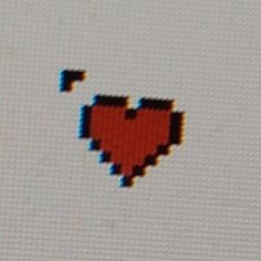 an image of a pixelated heart on a screen with the word i love you