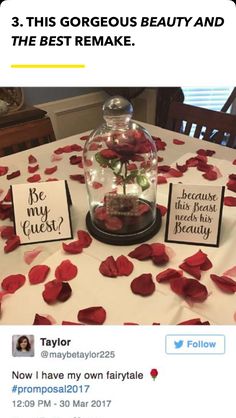 a table with rose petals on it and some cards in the middle that read 3 this gorgeous beauty and the beast