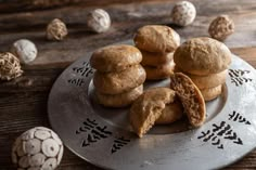 some cookies are sitting on a plate next to an egg