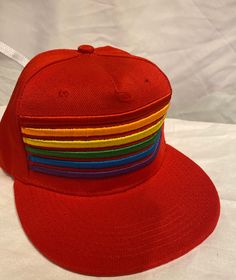 LGBT Rainbow Pride Snap Back Hat with flat brim Red hat with embroidered rainbow stripes Show your PRIDE with this stylish snap back hat. Perfect for everyday wear The rainbow stripes are beautifully embroidered and are 3D This hat is adjustable 😄 Free shipping! Casual Adjustable Rainbow Hat, Retro Multicolor Snapback Baseball Cap, Trendy Multicolor Flat Brim Baseball Cap, Trendy Multicolor Snapback Hat With Flat Brim, Retro Multicolor Snapback Hat, Trendy Multicolor Flat Brim Snapback Hat, Multicolor Snapback Baseball Cap, Adjustable Striped Baseball Cap, Trendy Red Snapback Hat With Flat Bill