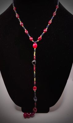 Bohemian Ruby Jewelry With Natural Stones, Single Strand Ruby Bead Necklace, Unique Ruby Gemstone Necklace, Ruby Necklace With Natural Stones For Gift, Elegant Ruby Necklace With Polished Beads, Ruby Necklace With Natural Stones As A Gift, Handmade Ruby Necklaces With Spiritual Style, Red Spiritual Jewelry With Gemstone Beads, Handmade Ruby Spiritual Necklaces