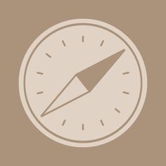 a clock with an arrow pointing to the left on a brown and white background,