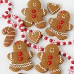 gingerbread cookies decorated with red and white beads