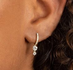 diamond huggie hoop earrings with charm•10k solid gold hoops•tiny gold hoops with diamond Drop Dangle•diamond earrings•gift for herDESCRIPTION --------------------This earring Made with 10K solid gold  Minimalist style with high-quality Moissanite (VVS clarity) (F Color), • Earring Size:→ Inner Diameter: 8 mm→ Outer diameter: 10 mm• Moissanite Details:→  Shape:  Round→  Measurement:  4.OO mm + 2.50 + 1.30  mm→  Number of Stone:  2 + 2 + 16→  Total  Ctw:  0.90→  Color: F Color →  Clarity: VVS• Me Diamond Hoop Earrings Small, Hoop Earrings With Charm, Hoops With Charms, Diamond Huggie Earrings, Diamond Huggies, Hoop Charms, Minimal Earrings, Simple Diamonds, Diamond Dangle Earrings