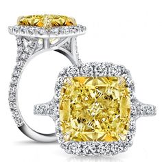 a fancy yellow diamond ring with two rows of diamonds around it