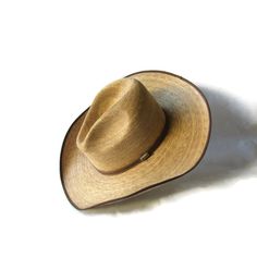 "This 4X quality US size 7 1/2 Atwood \"Trail Rider\" plaited palm cowboy hat has a Gus Crease crown that rises 5 1/2\", a 4\" brim that is trimmed with grosgrain, and a 1 3/4\" height comfort sweatband... ready for a hard day's work in the sun, or a night on the town!" Rustic Fedora Panama Hat For Rodeo, Rustic Curved Brim Straw Hat For Kentucky Derby, Rustic Adjustable Panama Hat For Rodeo, Brimmed Toquilla Straw Hat For Country Events, Rustic Wide Brim Straw Hat For Kentucky Derby, Toquilla Straw Brimmed Hats For Country Events, Natural Brimmed Hat For Ranch, Western Brimmed Panama Hat For Country Events, Western Straw Hat With Flat Brim For Ranch