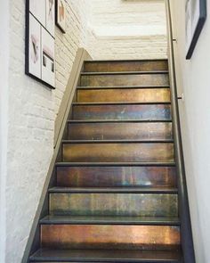 the stairs are made of metal and have been painted with metallic flecks on them