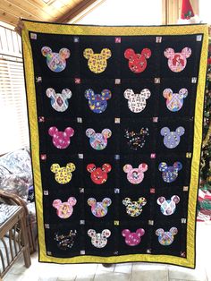 a quilt made to look like mickey mouse heads