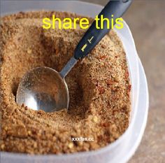 a spoon in a bowl filled with sand