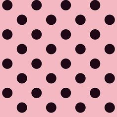 a pink background with black polka dots