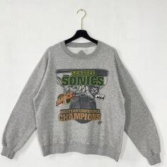 Unisex Sweatshirt - Gildan - Made To Order - 50% Cotton, 50% Polyester - Size Tts: True To Size - Various Sizes: S, M, L, Xl, 2xl - Loose Fit - Sewn In Label Great Gift Ideas For Family Or Friends Condition: New - Made To Order Please Wash In Cold Water At First Time 90s Style Tops For Fan Merchandise In Fall, 90s Style Winter Sweatshirt For Fans, Throwback Graphic Print Top For Winter, 90s Graphic Print Sweatshirt For Sports Season, 90s Graphic Print Sweatshirt For Fans, 90s Style Graphic Print Sweatshirt For Fans, Retro Winter Fan Merchandise Tops, Seattle Supersonics, Gift Ideas For Family