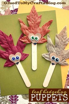 three leaf puppets with eyes and leaves on them