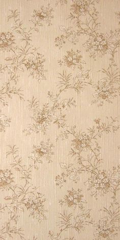 a beige floral wallpaper with small flowers on the top and bottom half of it