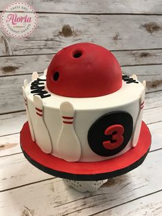 a cake that is shaped like a bowling ball