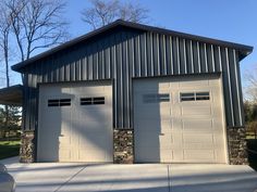 two garages are shown in front of a house