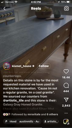 the kitchen counter top is made from wood and has an interesting message to read on it