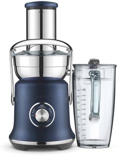 a blue blender sitting next to an empty glass container on top of it's side