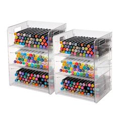 two clear acrylic drawers with lots of colored crayons in them