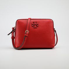 Material: Leather Zip Closure Size: 8"W X 6.5"H X 3"D Interior: Fabric Lining, Zip Pocket, 2 Slip Pockets Style 55440 Brilliant Red Red Textured Leather Crossbody Shoulder Bag, Red Textured Leather Shoulder Bag For Evening, Foldover Crossbody Bag, Tory Burch Crossbody Bag, Tory Burch Crossbody, Leather Camera Bag, Bags Logo, Tory Burch Bags, Interior Fabric