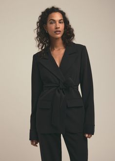 The Adrienne Blazer makes it a cinch to get dressed. Made from a lined structured-suiting fabric with a notch lapel and front flap pockets, it's an easy throw-on-and-go blazer. Plus, with a relaxed fit and waist-cinching self belt, the styling options are endless. 74% POLYESTER, 20% RAYON, 6% ELASTANEJessica is 5'9" wearing a size XS Heel Accessories, Favorite Daughter, Mule Sandals, Cinched Waist, Flat Boots, Black Blazers, Sweater Skirt, Sneaker Heels, Denim Pant