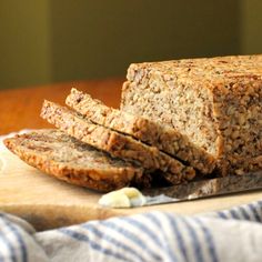 a loaf of bread sitting on top of a cutting board