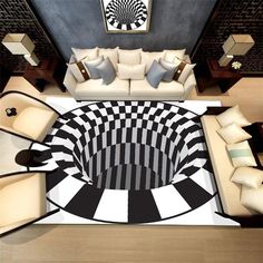 an aerial view of a living room with white couches and black and white rug