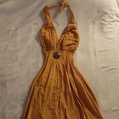 Gorgeous Mustard Colored Halter Dress With Embroidery Detail And Lace-Style Hem. Linen Type Material. Smocked Waist, One-Size-Fits-All, Hits At Mid-Calf On 5'7" Woman. Best For A Bcup Or Higher, Which Is Why I'm Selling, Since My A Cups Don't Fill It Out. Never Worn. Shifting Closet, U Cut, Dress With Embroidery, Lace Fashion, Embroidery Details, Monkeys, Boho Dress, Mid Calf, Dream Closet