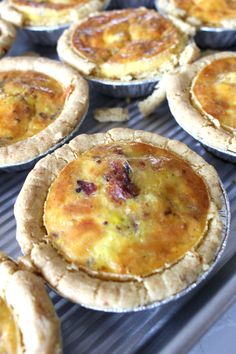 there are many small pies on the tray