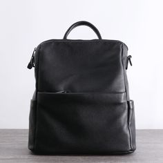 Overview： Design: Black Leather School Backpack Womens Cute College Backpack Purse Black Leather Travel Rucksack for LadiesIn Stock: Ready to Ship (2-4 days)Include: Only BagCustom: NoColor: BlackLeather: Cowhide,Measures: 32cm x 14cm x 30cm Weight: 0.6kgSlots: 2 main slots, 1 back zip slot, 2 outside zip slots, 1 phone pocket, 1 wallet pocket, 1 inside slotAccessories(option): NoneStyle: Black Leather School Backpack Womens Cute College Backpack Purse Black Leather Travel Rucksack for LadiesVer Work Backpack Women, All Black Backpack, Office Backpack, Best Laptop Backpack, Black Backpacks, Womens Work Bag, Leather School Backpack, Laptop Backpack Women, Work Backpack