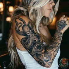 a woman with an octopus tattoo on her arm