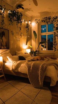 a bed room with a neatly made bed next to a window and a ceiling fan