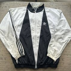 Brand: Adidas Color: White Size: Men’s Large Condition: Gently Used - Good Please Note: Color May Vary Slightly Due To Screen And Lighting. All Items, Unless Marked Nwt, Are Gently Used And May Have Signs Of Wear. Vintage Items Are 20-40 Years Old!!! We Try To Call Out Any Flaws/Imperfections In The Description. Please View All Photos For Condition And Feel Free To Message Me For More Pictures Or Measurements. Please Wash All Items Prior To Wear. Want This Piece For A Lower Price? Then, Shop My White Sportswear Outerwear With Pockets, Urban White Track Jacket With Pockets, White Track Jacket With Pockets For Fall, Retro White Cotton Outerwear, White Retro Cotton Outerwear, White Sporty Track Jacket With Pockets, White Retro Long Sleeve Outerwear, White Casual Track Jacket With Pockets, Casual White Track Jacket With Pockets