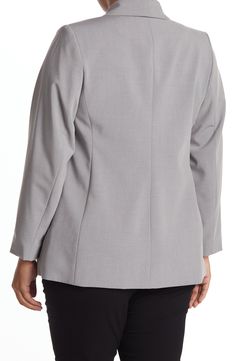 Elevate your professional wardrobe with this flattering shawl collar blazer featuring an open front and optional roll-up cuffs for trendy style. 32" length (size 14W) Shawl collar Long sleeves Open front Chest welt pocket Front welt pockets Woven construction Lined Shell: 65% polyester, 31% rayon, 4% spandex/Lining: 100% polyester Dry clean Imported Model’s stats for sizing: 5’9” height, 40” bust, 35” waist, 48” hips. Model is wearing size 14W. Calvin Klein Notch Lapel Business Casual Blazer, Classic Calvin Klein Blazer For Work, Calvin Klein Long Sleeve Business Blazer, Calvin Klein Long Sleeve Business Casual Blazer, Calvin Klein Notch Lapel Blazer For Work, Elegant Long Sleeve Calvin Klein Blazer, Calvin Klein Long Sleeve Career Blazer, Calvin Klein Blazer For Business Casual In Fall, Elegant Calvin Klein Blazer For Fall