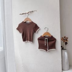 Get ready for some serious baby cuteness with our Textured Knit Set! The textured fabric adds a playful touch to this short sleeve top and matching shorts. Plus, the drawstring waist ensures the perfect fit for your little one. Cute and comfy, it's a must-have for any trendy baby (or their stylish parents)! Cute Brown Tops For Playwear, Cute Brown Tops For Playtime, Cute Knit Tops For Playtime, Casual Knit Tops For Playtime, Brown Short Sleeve Sets For Summer, Kid Outfits, Matching Shorts, Trendy Baby, Pullover Shirt