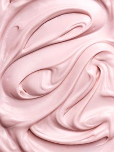 a close up view of pink whipped cream