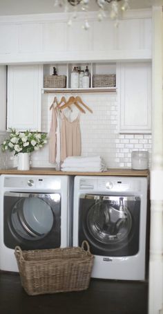 a washer and dryer in a small room