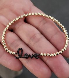 "* 3 mm Gold Filled (14/20) Beads * Love Gold Plated Sterling Silver, Sterling Silver Available in Various Sizes. Please choose from drop down list. I make 6.5\" for most wrist size and 5.5\" for kid's size. To determine your bracelet size: Measure with a tape around your wrist (where you would like the bracelet to sit). If you don't have access to a measuring tape, wrap a string around your wrist and measure the length with a ruler. This is your wrist size. To determine your bracelet size add 1 Stackable Jewelry For Friendship On Valentine's Day, Beaded Jewelry For Anniversary On Valentine's Day, Valentine's Day Anniversary Beaded Jewelry, Adjustable Gold Beaded Bracelets With Custom Text, Round Beaded Bracelets For Valentine's Day, Valentine's Day Adjustable Jewelry With Letter Beads, Adjustable Letter Beads Jewelry For Valentine's Day, Elegant Beaded Charm Bracelet For Valentine's Day, Valentine's Day Stackable Friendship Jewelry