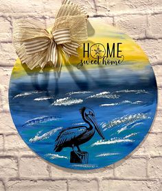 For the beach lovers, this wooden round has been hand painted and sealed against harsh weather conditions. It measures 18x18 inches and is 1/4 inch thick. Front Door Hanger, Wooden Door Hanger, Home Handmade, Beach Lovers, Home Sweet Home, Door Hanger, Door Hangers, Weather Conditions, Decor Home