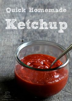 homemade ketchup in a small glass bowl with a spoon on the side and text overlay that reads quick homemade ketchup