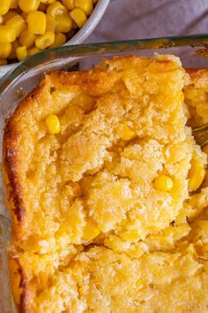 a casserole dish with corn on the side