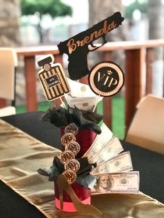 a table topped with money and paper decorations