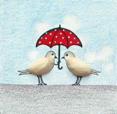 two birds are standing under an umbrella