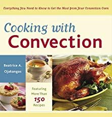 the cover of cooking with convection, featuring pictures of turkeys and other food items