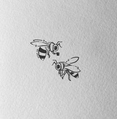 two bees on white paper with black ink