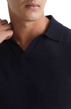 Soft, luxurious wool elevates a timeless polo-sweater topped with a smart Johnny collar. 26 1/2" length (size Medium) Johnny collar Short sleeves 100% wool Hand wash, dry flat Partially lined Imported Classic Fitted V-neck Polo Sweater, Fitted Navy Polo Sweater With Ribbed Collar, Navy Fitted Collared Polo Sweater, Fitted Navy Collared Polo Sweater, Classic Navy Tops For Winter, Classic Navy Top For Winter, Collared Wool Tops For Winter, Classic Wool Tops For Fall, Formal Merino Wool Fine Knit Top